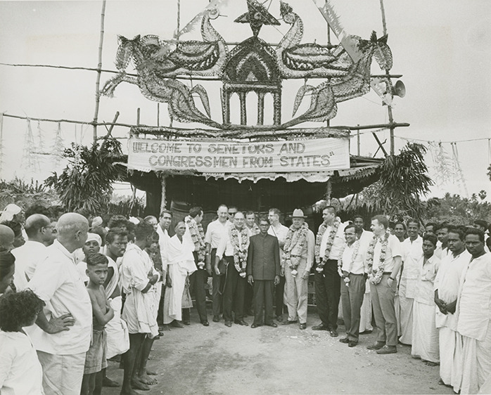 Photograph of members of the Congressional Delegation in front of ceremonial tent<br /><br />
