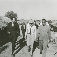 Photograph of the Congressional Delegation touring an Indian village<br /><br />

