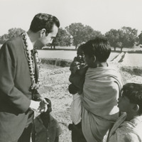 Photograph of Congressman Bob Dole with Indian children<br /><br />

