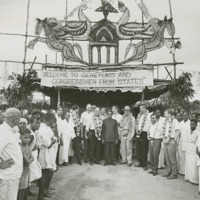 Photograph of members of the Congressional Delegation in front of ceremonial tent<br /><br />
